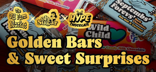 Assorted colourful chocolate bars with playful wrappers displaying names like Septembers Forest and Wild Child are arranged under bold text: Golden Bars & Sweet Surprises. Brand logos for Old Farm Market, Oh Sugar and Hyper Chocolate are on the top left. 